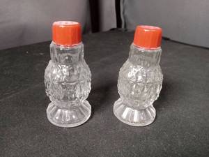 lot 40914 image: Cut Glass Salt and Pepper Shakers with Red Tops