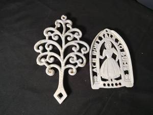 lot 40777 image: Cast Iron Kitchen Trivets Set - Woman Figure and Decorative Tree Design