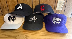 lot 45 image: Lot of 5 Baseball Caps  As, Cleveland Guardians, Notre Dame, Kansas State & Aberdeen IronBirds  Mixed Fitted & Adjustable