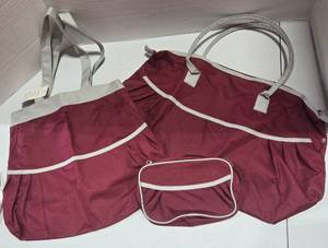 lot 319 image: Burgundy Canvas Duffel Bag Set with White Trim