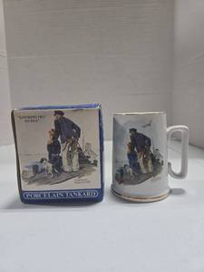 lot 324 image: Norman Rockwell Looking Out To Sea Porcelain Tankard with Original Box
