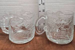 lot 380 image: 1995 McDonalds Batman Forever The Riddler and Two-Face Collectable Mug Set.