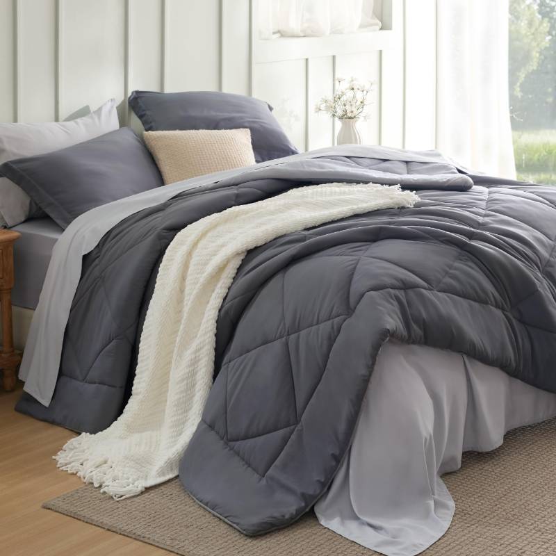 lot 16549 image: Bedsure King Size Comforter Set - 7 Pieces Reversible Dark Grey Bedding, King Size Bed Set for All Seasons, Bed in a Bag with Down Alternative Comforter, Sheets, Pillowcases & Shams - Retail $70