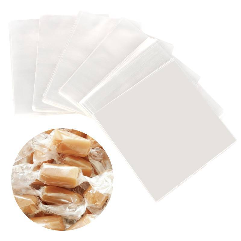 lot 36333 image: 600 Pcs Candy Wrappers for Caramels, Clear Cellophane Wrapper Xmas Nonstick Chocolate Wrapping Wax Paper Sweets Holiday Baking Packaging 5 x 5 - Retail $9