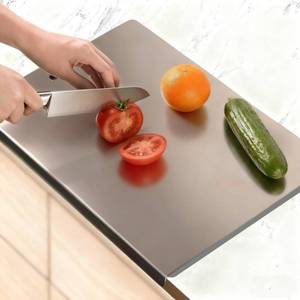 lot 42235 image: Large Stainless Steel Cutting Boards for Kitchen, Chopping Boards with Grey Non-slip Mat, Cutting Board with Counter Lip for Meat, Fruits, Vegetables, Bread,Dough(15.75 x 11.81) - Retail $36