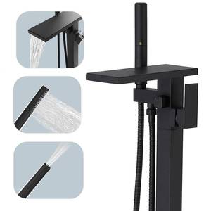 lot 4517 image: Hoimpro Tub Filler Freestanding Bathtub Faucet Matte Black Floor Mount Tub Faucet Waterfall Free Standing Bathtub Filler High Flow Brass Bath Shower Faucets with Handheld Sprayer - Retail $190