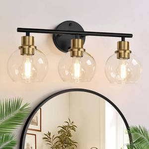lot 1072 image: Indoi 3-Light Bathroom Light Fixtures, Black and Gold Bathroom Lights Over Mirror with Clear Glass Globe Shade, Vanity Lights for Bathroom Kitchen Living Room Hallway Cabinet Bedroom Porch - Retail $70