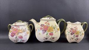 lot 35 image: Limoges Vintage China Teapot, Cream Pitcher and Sugar Bowl