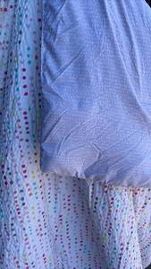 lot 105 image: Twin Comforter Confetti Pattern Reversing to Lavender Polka Dot
