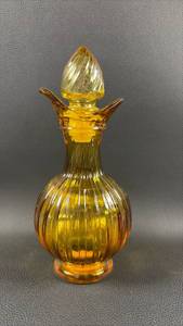lot 114 image: Vintage Avon Amber Glass Bottle with Stopper