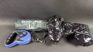 lot 120 image: Dog Waste Bags Large Roll with Retractable Leash and Small Dog Puffer Coat