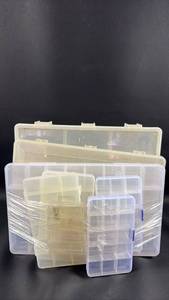 lot 125 image: Plastic Storage Containers with Multiple Compartments Largest Measures Approximately 12 Inches by 14 Inches