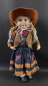 lot 139 image: Porcelain Cowgirl Doll with Western Outfit and Hat