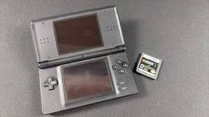 lot 165 image: Nintendo DS Lite (will need charger) AND Star Wars II Game
