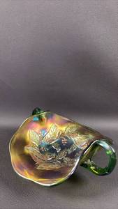 lot 173 image: Millersburg Holly Whirl Handled Bon Bon Dish with Deep Green Glass and Iridescent Finish