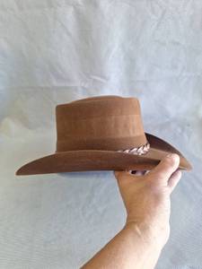 lot 66 image: Stetson Brown Cowboy Hat with Feather Band, Size 6-78