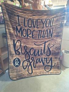 lot 69 image: I Love You More Than Biscuits and Gravy Fleece Throw Blanket - Like New