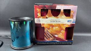 lot 91 image: Sparkle Cityscape Electric Wax Warmer and  Apple Pie Candle Jar Set
