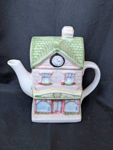 lot 2038 image: Ceramic House Shaped Teapot with Clock Face - 6.5 in