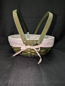lot 3120 image: Green Woven Basket with Pink Fabric Liner and Folding Handles