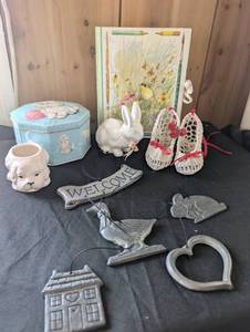 lot 3158 image: Home Decor Collection with Cat Tin, Ceramic Animals, Crochet Slippers and Metal Ornaments