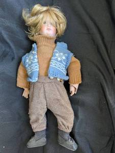 lot 4016 image: Porcelain Boy Doll with Knitted Outfit
