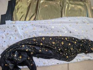 lot 4623 image: Mixed Fabric Bundle with Star Print and Metallic Materials