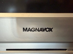 MAGNAVOX 32" FLAT SCREEN TV AND DVD/VCR PLAYER