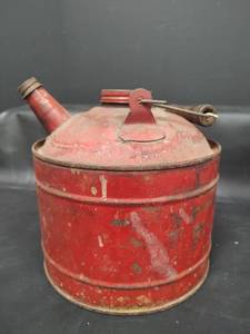 lot 204 image: Vintage Red Metal Gasoline Can with Spout and Wooden Handle