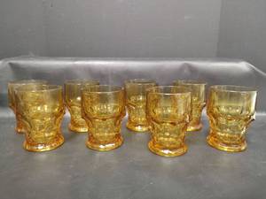 lot 217 image: Vintage Anchor Hocking  Honey Amber Glass Drinking Glasses, 4.25 Inches Tall, Set of 8