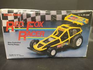 lot 301 image: NIB Radio Shack Red Fox Racer Wire-Controlled Racing Buggy, Works
