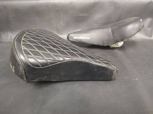 lot 303 image: Murray and Black Leather Bicycle Seats