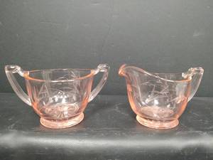 lot 304 image: Vintage Pink Depression Glass Sugar Bowl and Creamer with Starburst Pattern