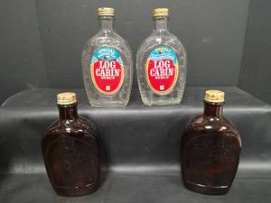 lot 327 image: Vintage Log Cabin Syrup Bicentennial 1776-1976 Bottles