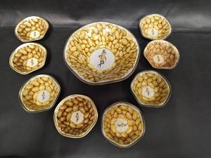 lot 346 image: Vintage Mr. Peanut Advertising Metal Bowl and Dish Set