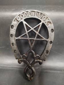 lot 383 image: Vintage 7 inch Cast Iron GOOD LUCK Horseshoe Trivet