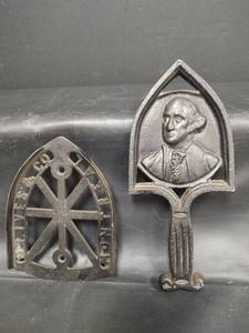 lot 384 image: Vintage 9 inch George Washington Cast Iron Trivet