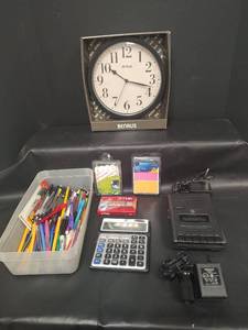 lot 458 image: Mixed Office Supplies Bundle with Clock, Calculator, and Cassette Recorder