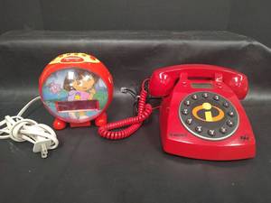 lot 476 image: Dora the Explorer Alarm Clock Radio, Runs, and The Incredibles Rotary Phone, Untested