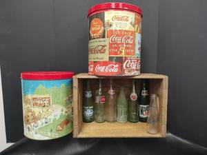 lot 543 image: Vintage Coca-Cola Tins with Bottle Collection in Crate