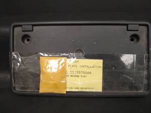 lot 555 image: Front License Plate Mount Bracket Installation Kit