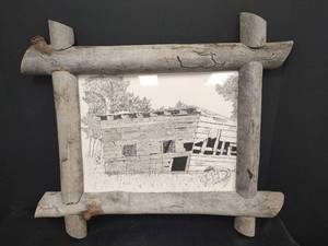 lot 557 image: Hand Drawn Pen and Ink Cabin with Rustic Driftwood Frame, Overall 22 x 19