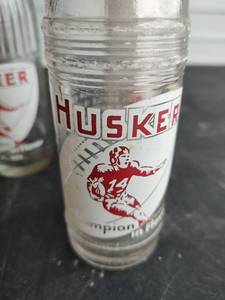 lot 615 image: Vintage Husker ACL Seward, Nebraska Football Player #14 Pop Bottles