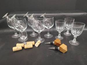 lot 624 image: Wine and Cordial Glasses with Wood Bottle Stoppers and Corks