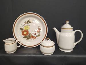 lot 634 image: Vintage Mountain Wood Collection Stoneware Trellis Blossom, 12 inch Platter, Tea Pot, Sugar and Creamer