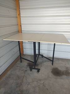 lot 676 image: Folding Craft Table with Rolling Casters, Open 59x36x35, Missing One Roller