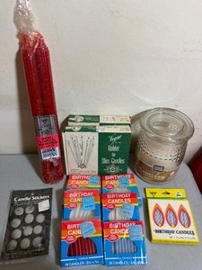 lot 23 image: Red Metal Pail Full of Candles and a Flashlight