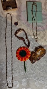 lot 37 image: Jewelry - Child-Sized NecklaceBracelet, Bull Fighter, Picture Frame Pendant and More