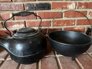 lot 91 image: Cast Iron Teapot (marked Erie, 8) and Bowl w Handle (marked 7)