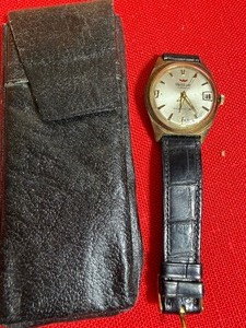 lot 106 image: Pencil Box of Kids Treasures  Vintage Waltham Watch, Pins, Ammo and MORE